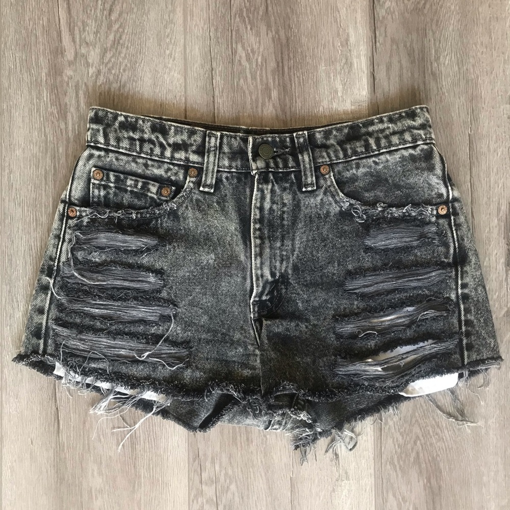 Levi high waisted black distressed shorts